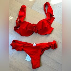 Red bikini set, never used, still with tags. Size M